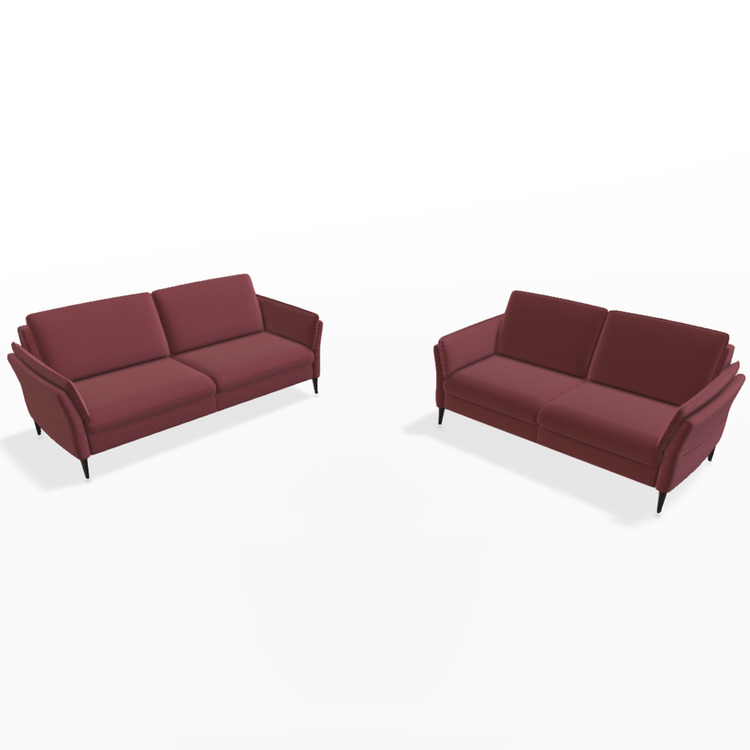 Zwei moderne, rote Sofas mit schwarzen Füßen.
