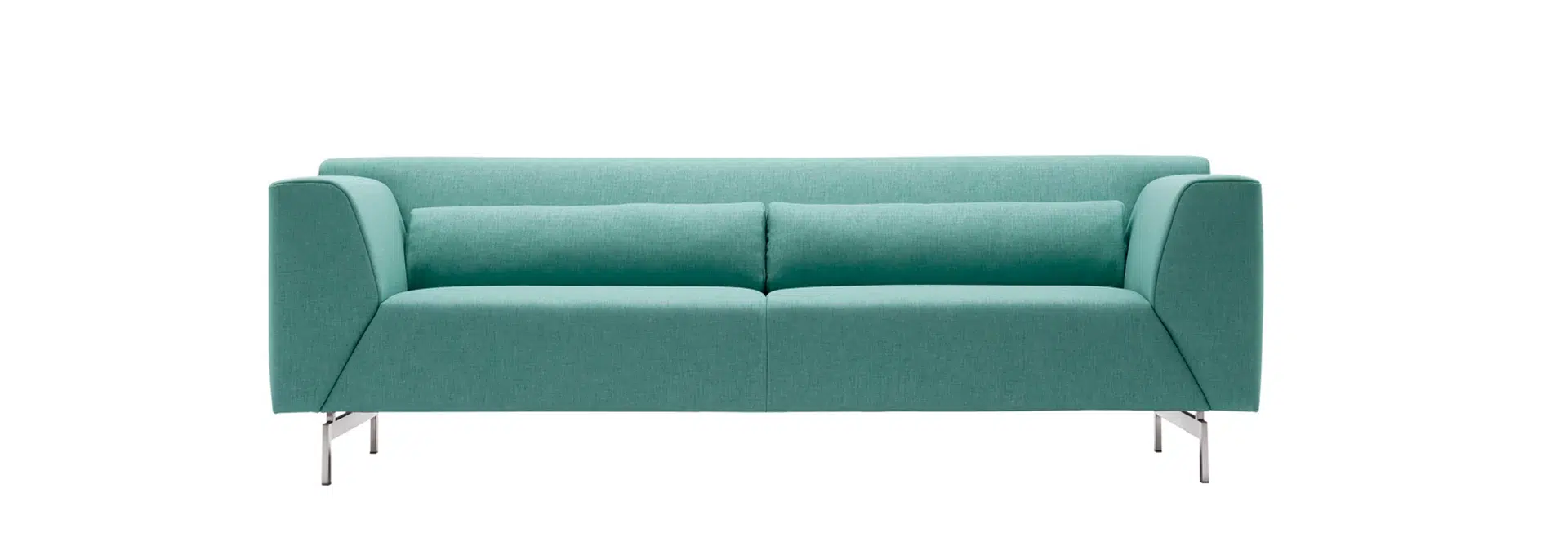 Hellgrünes, modernes Sofa mit metallischen Füßen.