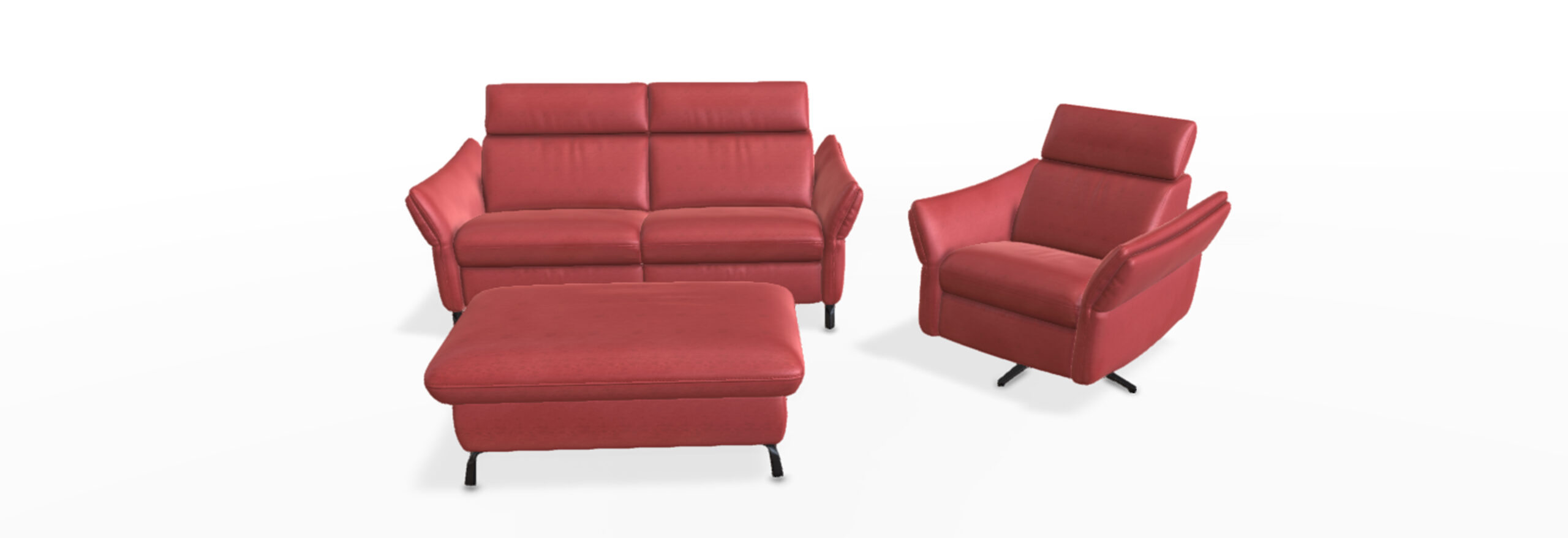 Rotes Ledersofaset mit Sessel und Hocker.