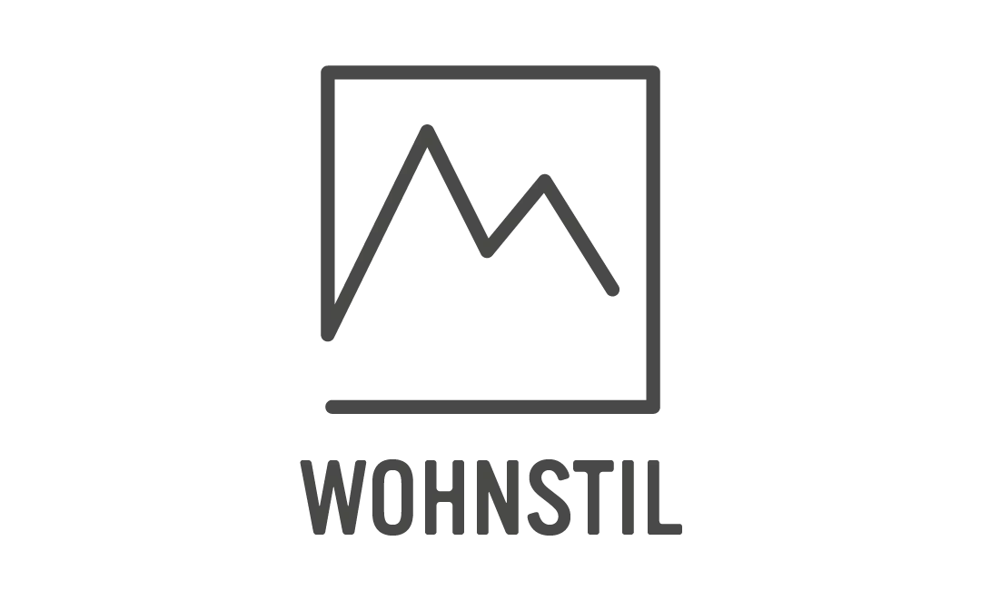 Wohnstil-Logo mit grafischen Bergen.