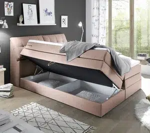 Modernes Bett mit Stauraum und Dekorationselementen.