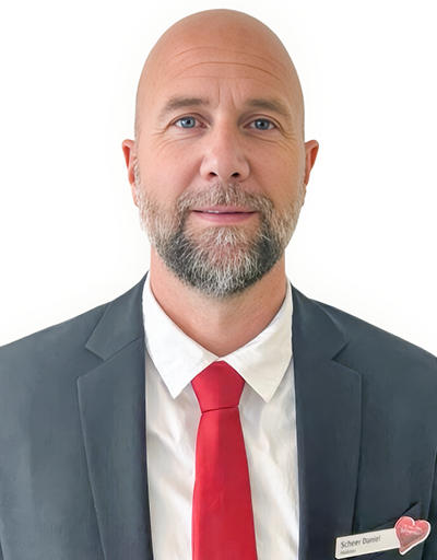 Filialleiter Fellbach, Daniel Scheer. Mann in Anzug.