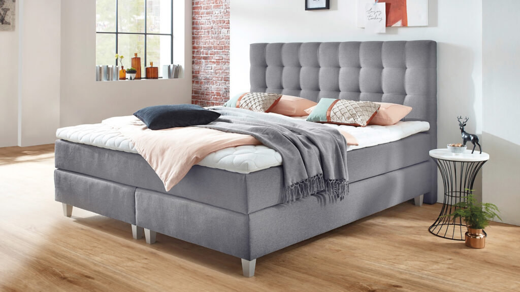 Fischer Designwerkstatt Boxspringbett grau gestepptes Kopfteil