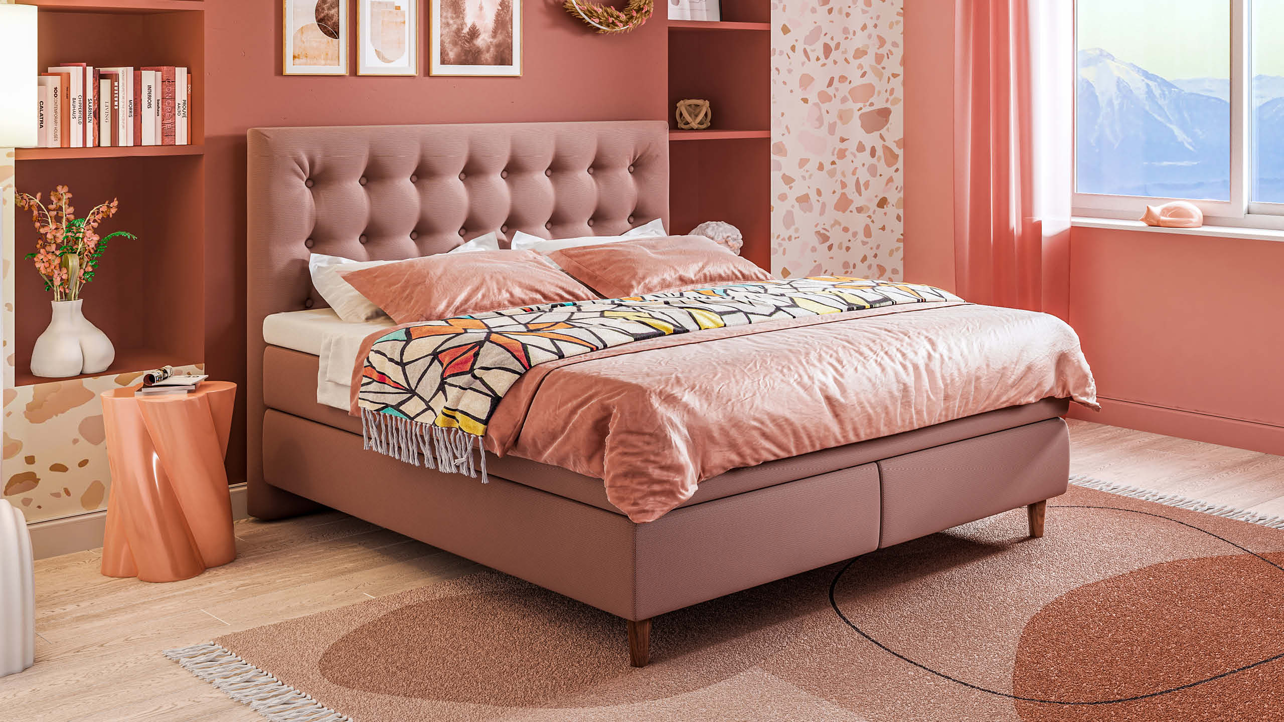 Boxspringbett in Altrosa mit gepolstertem, gestepptem Kopfteil vor farblich abgestimmter Wandgestaltung im modernen Schlafzimmer – Polstermöbel Fischer.